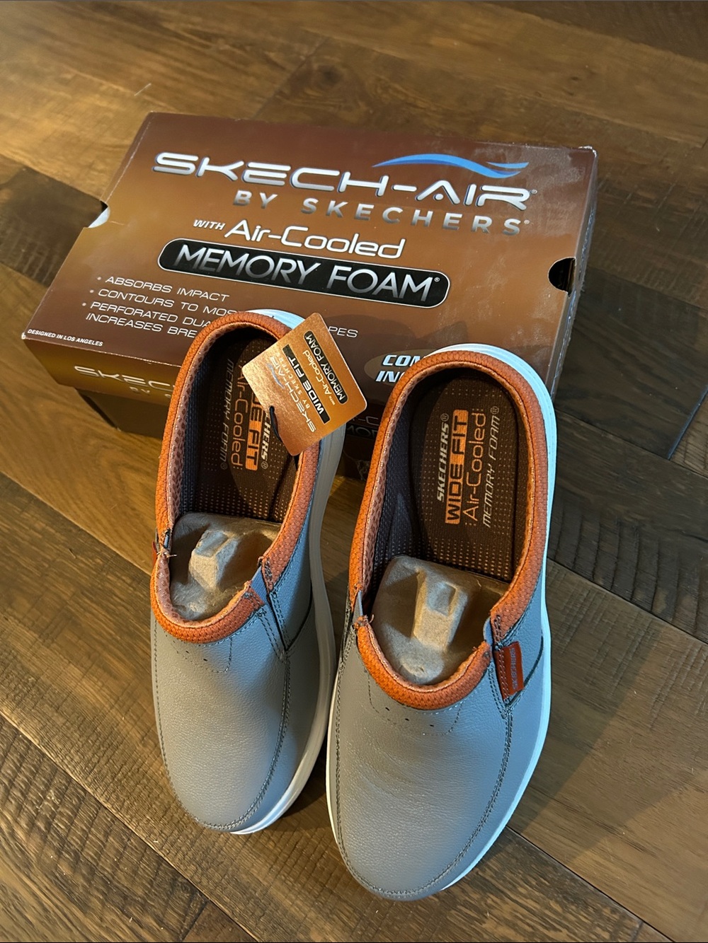 Skechers Men’s Slip-On Loafers in Light Gray with Orange Accents